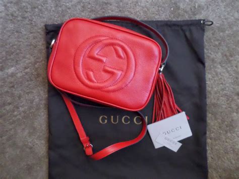 gucci soho wristlet replica|gucci bag red and blue.